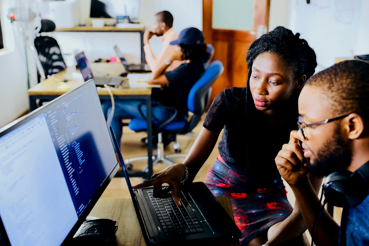 Children learning on computers in a classroom