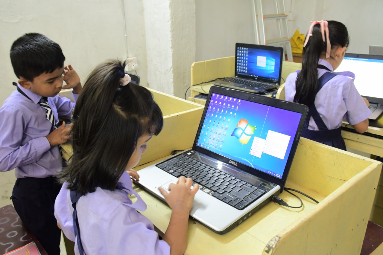 A parent and child reading together at home