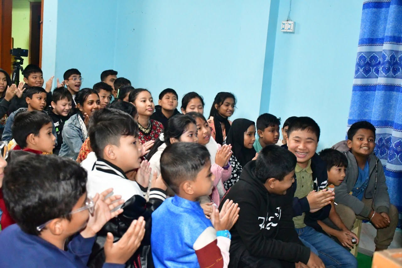 A student speaking confidently in front of the class